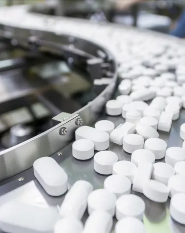 Guar gum used in pharmaceutical tablet manufacturing for improved binding and oral suspension stability.