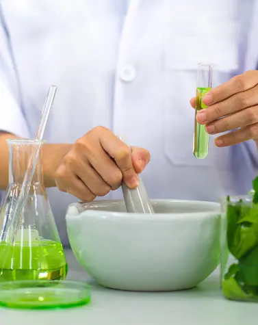 Lab technician testing natural hydrocolloids with green solutions for food and pharma applications.